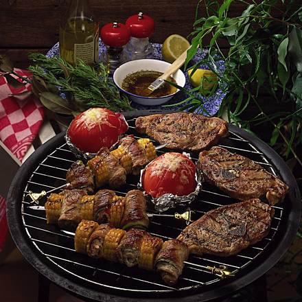 Colorful skewers and marinated lamb chops