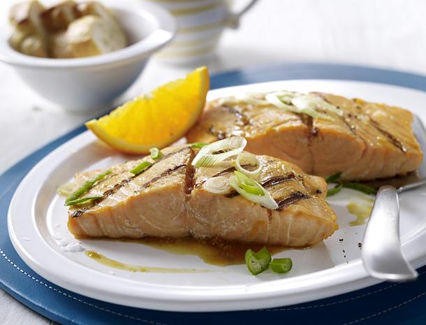 Grilled salmon in orange and soy marinade