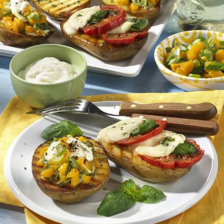 Baked potatoes with colorful toppings